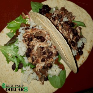 Cheap homemade tacos made with chicken, rice, and beans