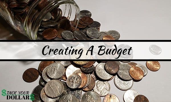 Picture of coins spilling from a glass jar with the title, "Creating a budget".