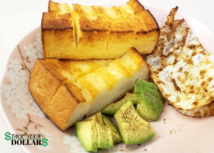 Thick French toast, fried egg whites and avocado