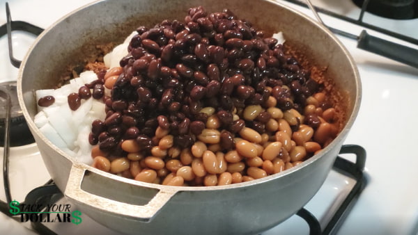 Pot with burrito filling being cooked (beef, beans, onions)