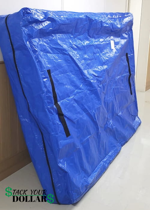 Queen mattress in a blue trap bag
