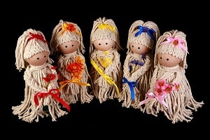 5 mop dolls of various colors