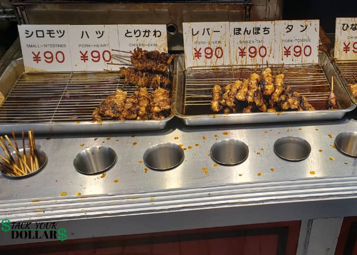 Yakitori stand with pork and chicken sticks for 90 yen each