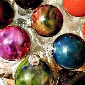 Christmas ornaments marbled with melted crayons